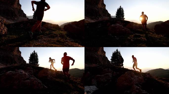 日落时分，两个人在山上跑步