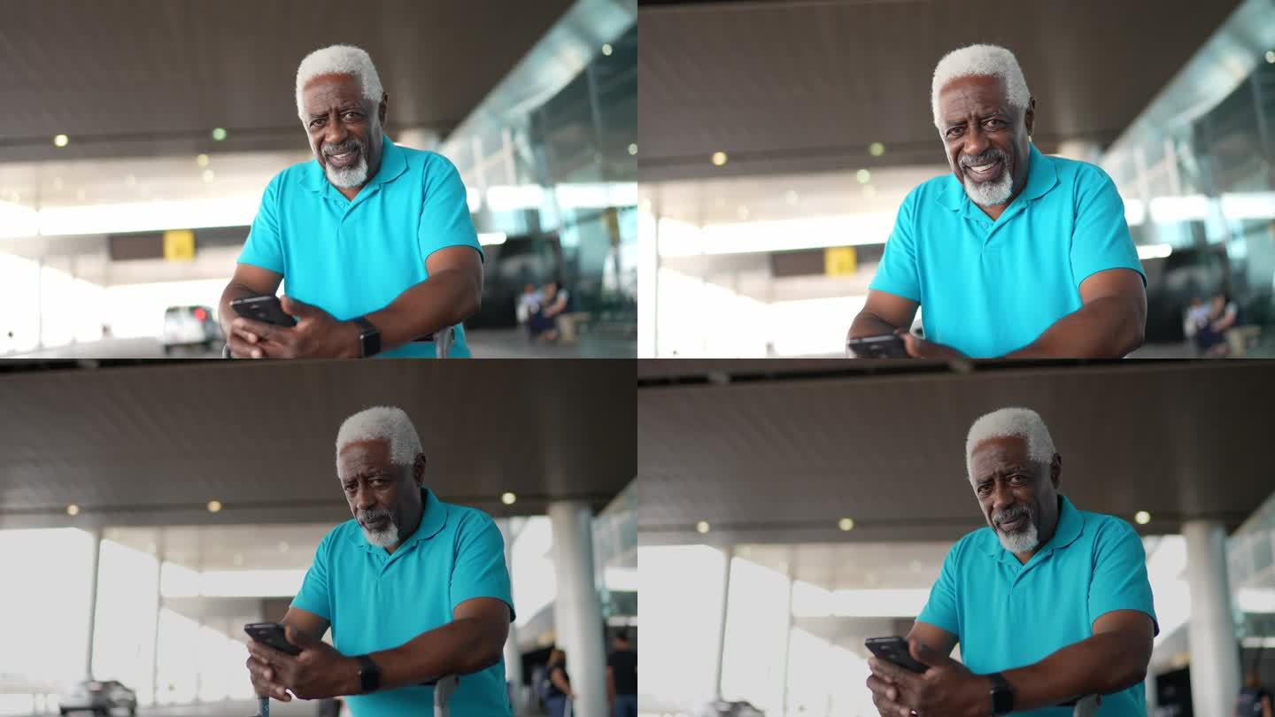 一位老人在机场等出租车时使用手机的照片