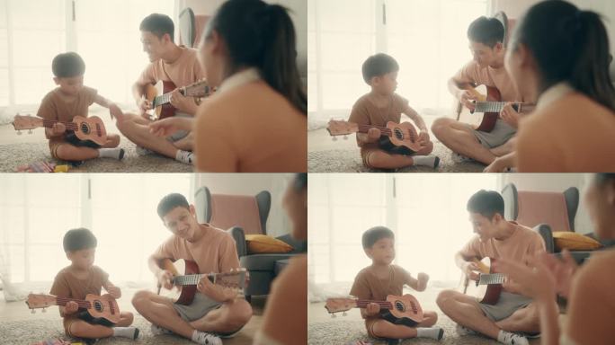 温馨的家庭教育时刻:快乐的家庭，儿子弹吉他，创造回忆。