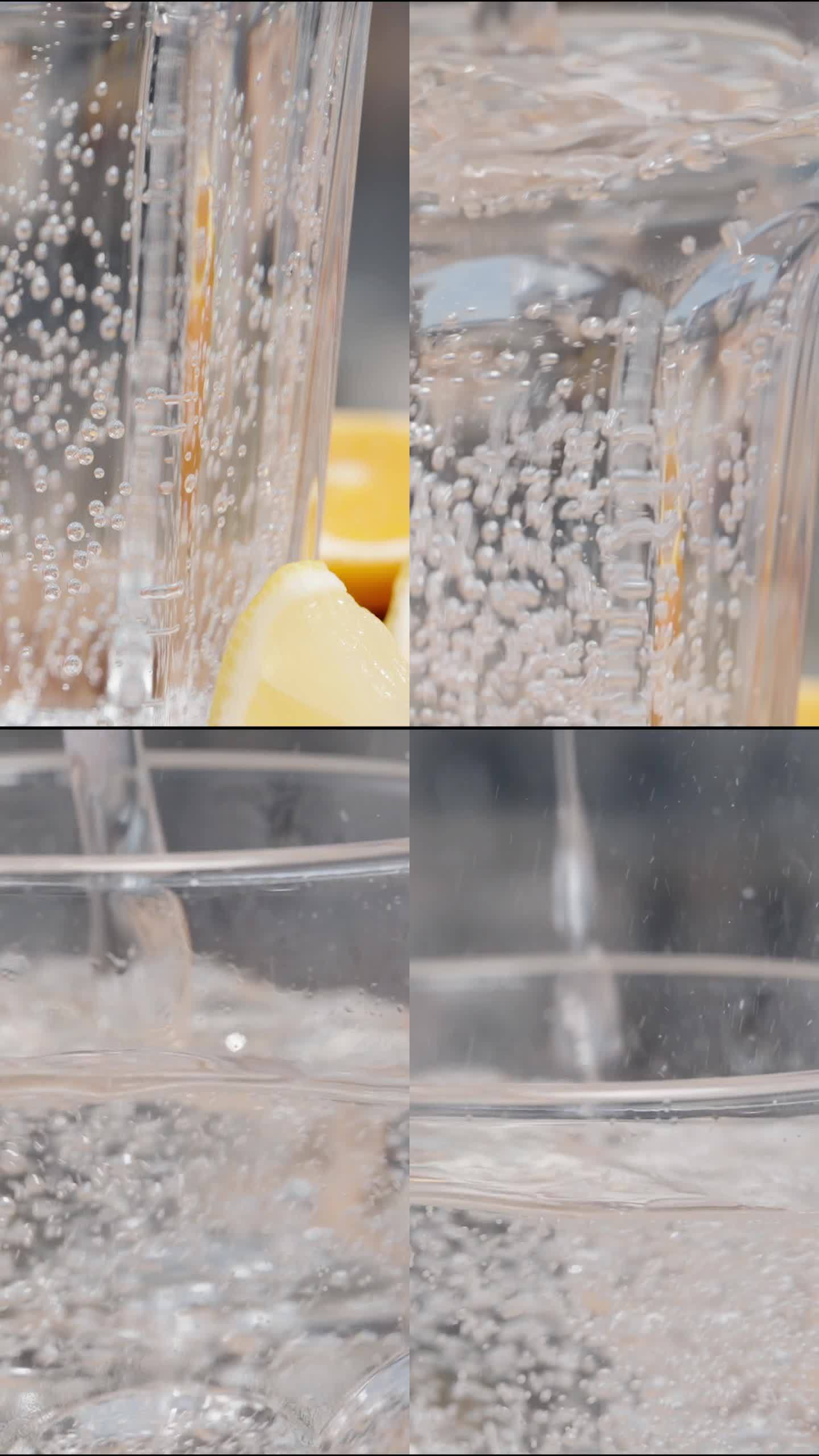 垂直视频。向上移动，柠檬和橘子片放在桌子上，苏打水被倒进杯子里。