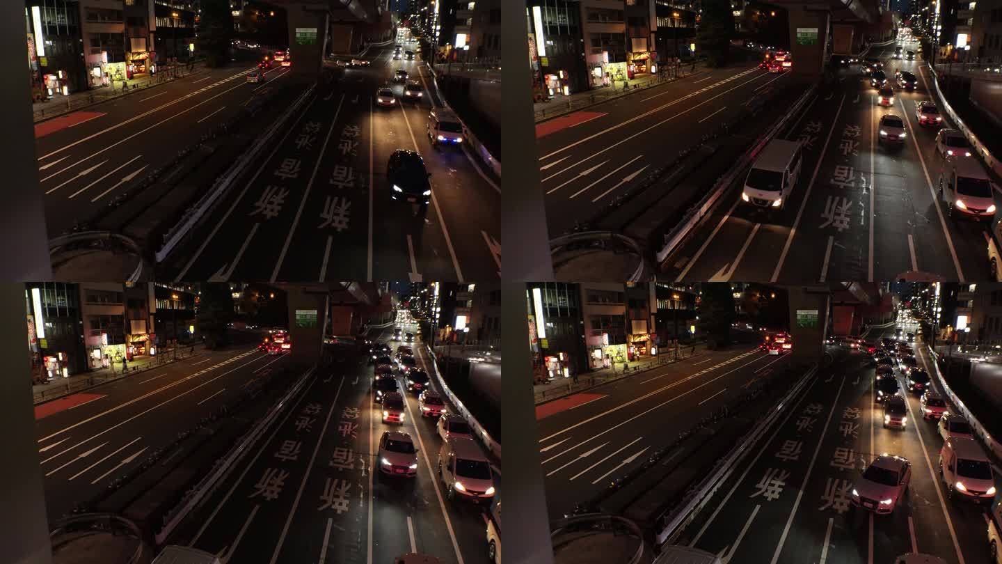 东京，日本:夜间街道交通(路口)鸟瞰图。