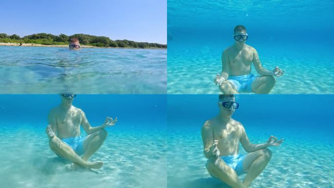 男性朋友戴着潜水面具，以冥想的姿势潜入海中