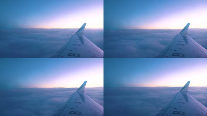 飞机穿越云层机翼飞翔云端俯瞰云海