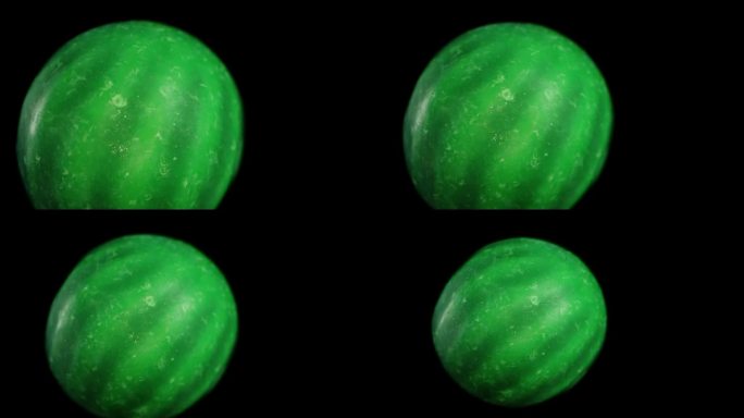 绿西瓜形状的软糖。在黑色背景上模拟向下坠落。多莉微距变焦。
