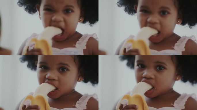 小女孩在吃香蕉儿童可爱