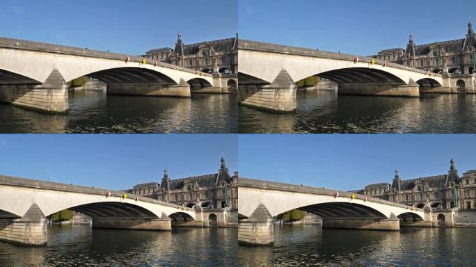 法国巴黎塞纳河岸边的卡鲁塞尔桥和卢浮宫博物馆大楼