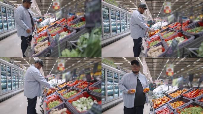 一个超重的男人在超市的农产品摊上挑选西红柿。