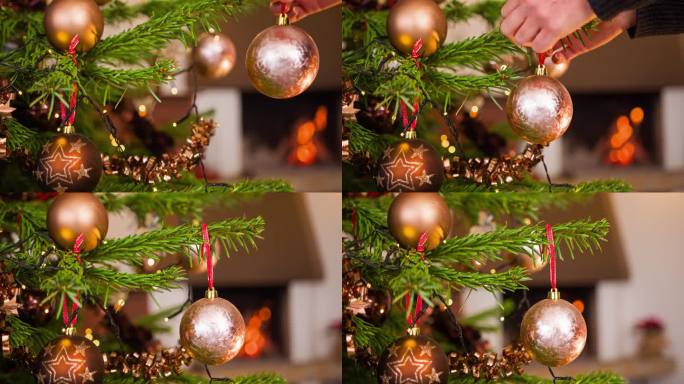 在圣诞树上放置装饰品的特写镜头