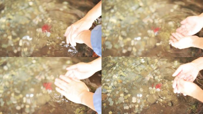 一个人在杭州径山寺洗手池洗手慢镜头