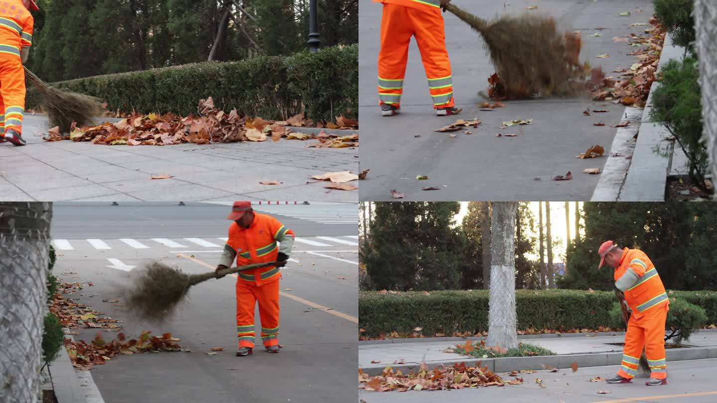 清洁工扫树叶马路