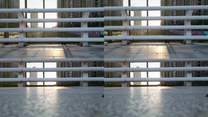 阳光 逆光 铁路桥 学生走过 路面 栏杆