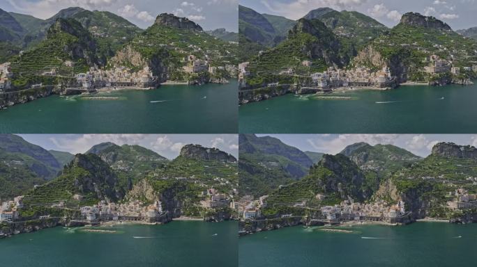 阿马尔菲意大利航拍v5电影飞越蔚蓝的大海捕捉风景如画的风景僻静的沿海阿特拉尼镇村庄巢在山谷在夏天-拍