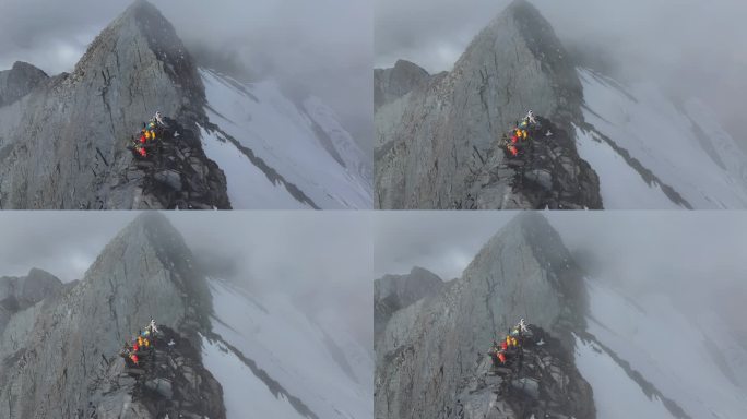 航拍登顶横断山脉乌库楚雪山的登山者