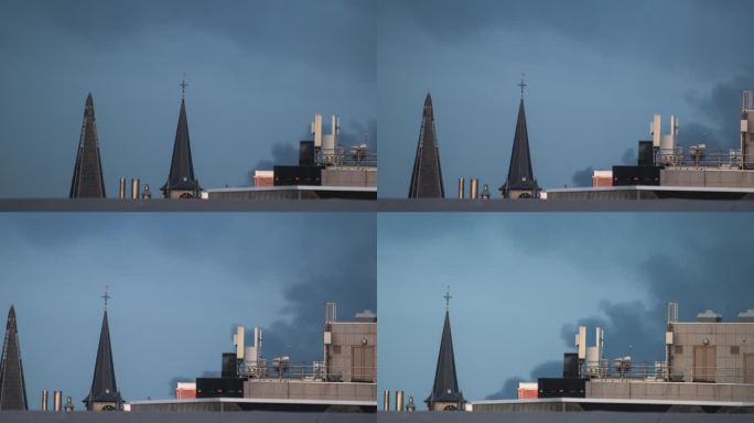 在比利时的安特卫普，当烟雾弥漫，灯光渐暗时，屋顶上的锅。