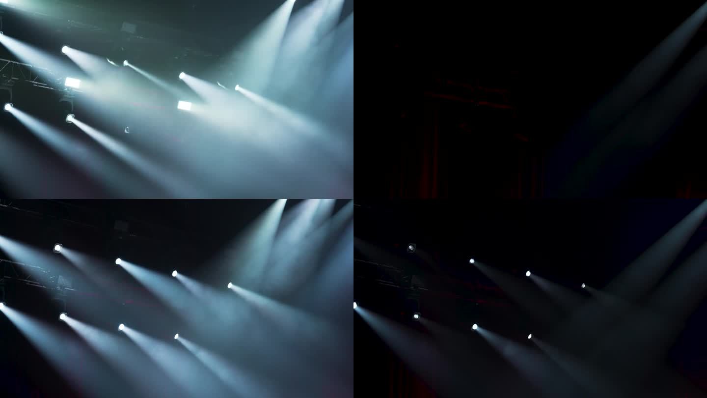 剧场灯光表演。舞台照明效果。聚光灯投影仪照亮场景