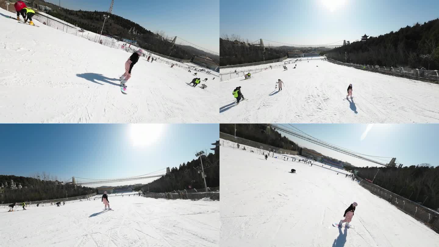 穿越机航拍美女滑雪特写冬日极限运动技术