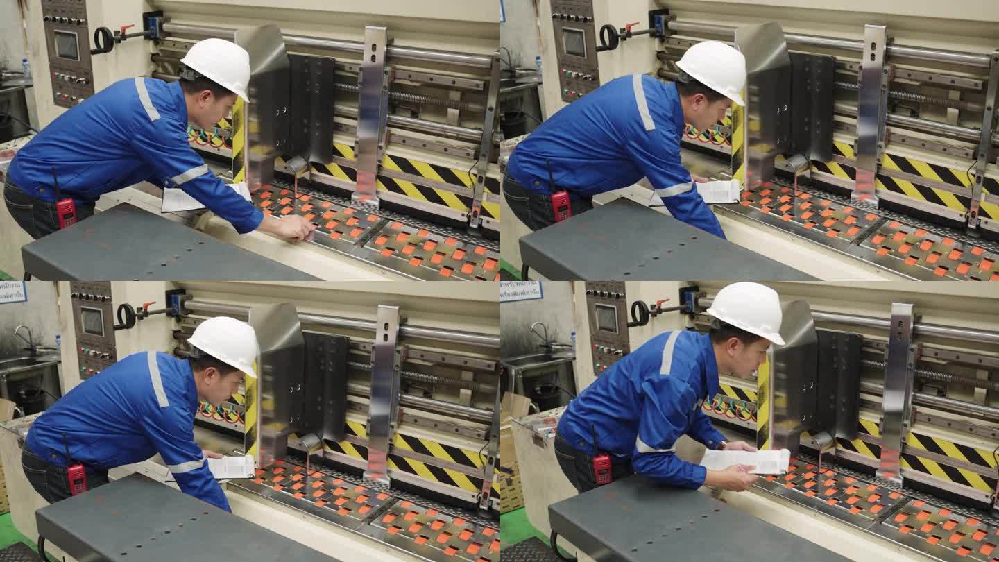 质量控制经理纸板纸厂工程师检查大型机器输送纸生产线