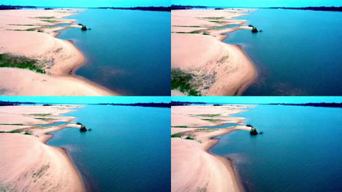 河滩上的沙洲和蓝色的海水。巴西的亚马逊河流域。空中