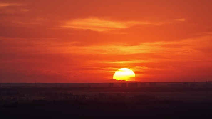 吐鲁番库木塔格沙漠光影巨大的太阳日落延时