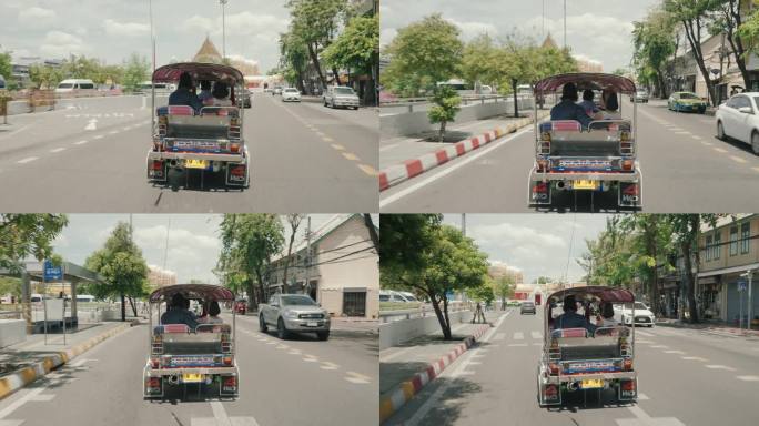快乐的度假者:一对夫妇乘坐当地的嘟嘟车在曼谷的冒险。
