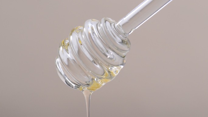 蜂蜜流下 升格 缓慢流入 透明液体