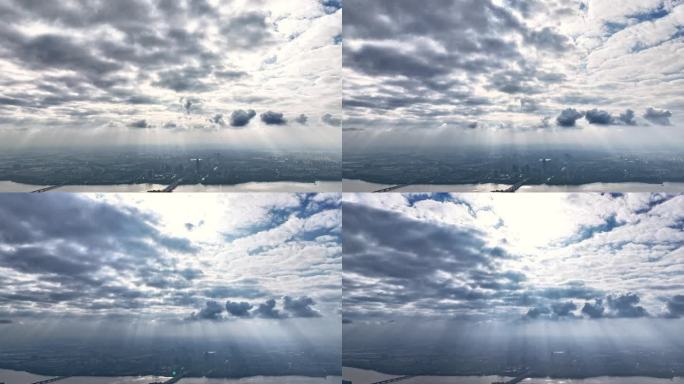 航拍平原云层丁达尔效应光影延时摄影