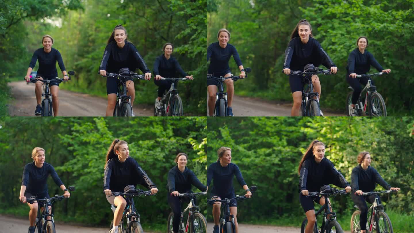 夏日里在森林里骑自行车的快乐女性朋友，在大自然中骑自行车旅行