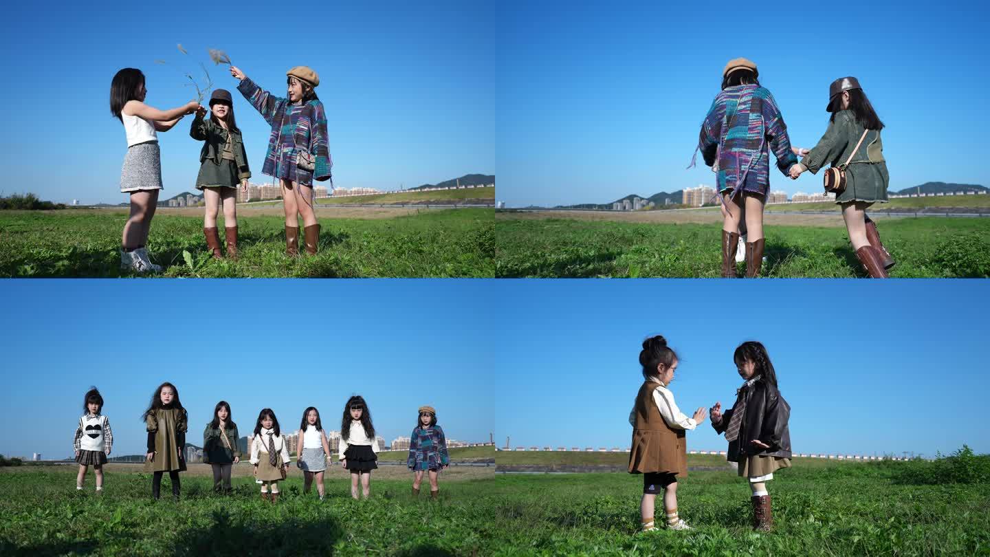 4K一组小女孩在草地上奔跑转圈圈做游戏