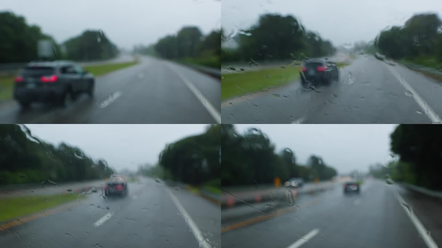 由于下雨，路上能见度低。桥隧道路上的汽车在弗吉尼亚州的暴雨中行驶。驾驶牌照，POV汽车司机