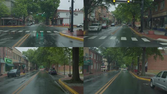 湿路上有危险。多佛尔市中心人行横道上的阵雨。驾驶牌照，道路的POV