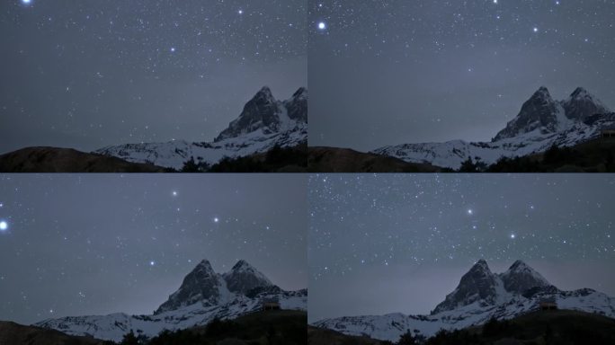 宁静的夜晚，明亮的星星在乌什巴山的天空中移动，雪峰在时间的流逝中消失