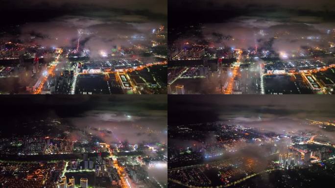 航拍云雾下的云南临沧夜景城市穿云航拍