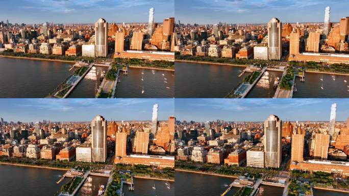 美丽明亮的纽约全景在晴天。无人机镜头拍到靠近河边的一栋高楼。