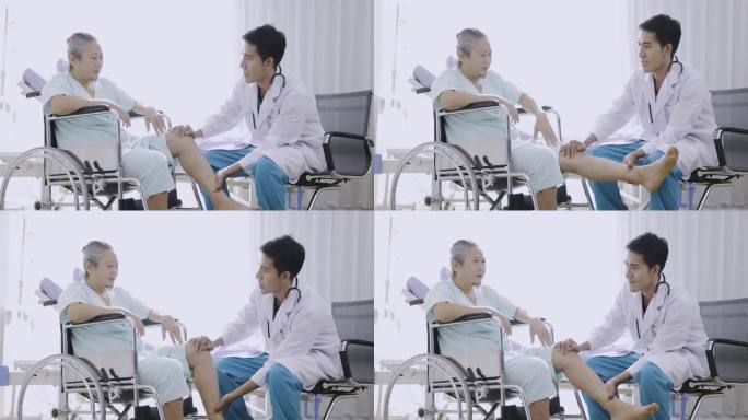 老人膝部疼痛，老人住院。亚洲医生照顾坐轮椅的老年病人。
