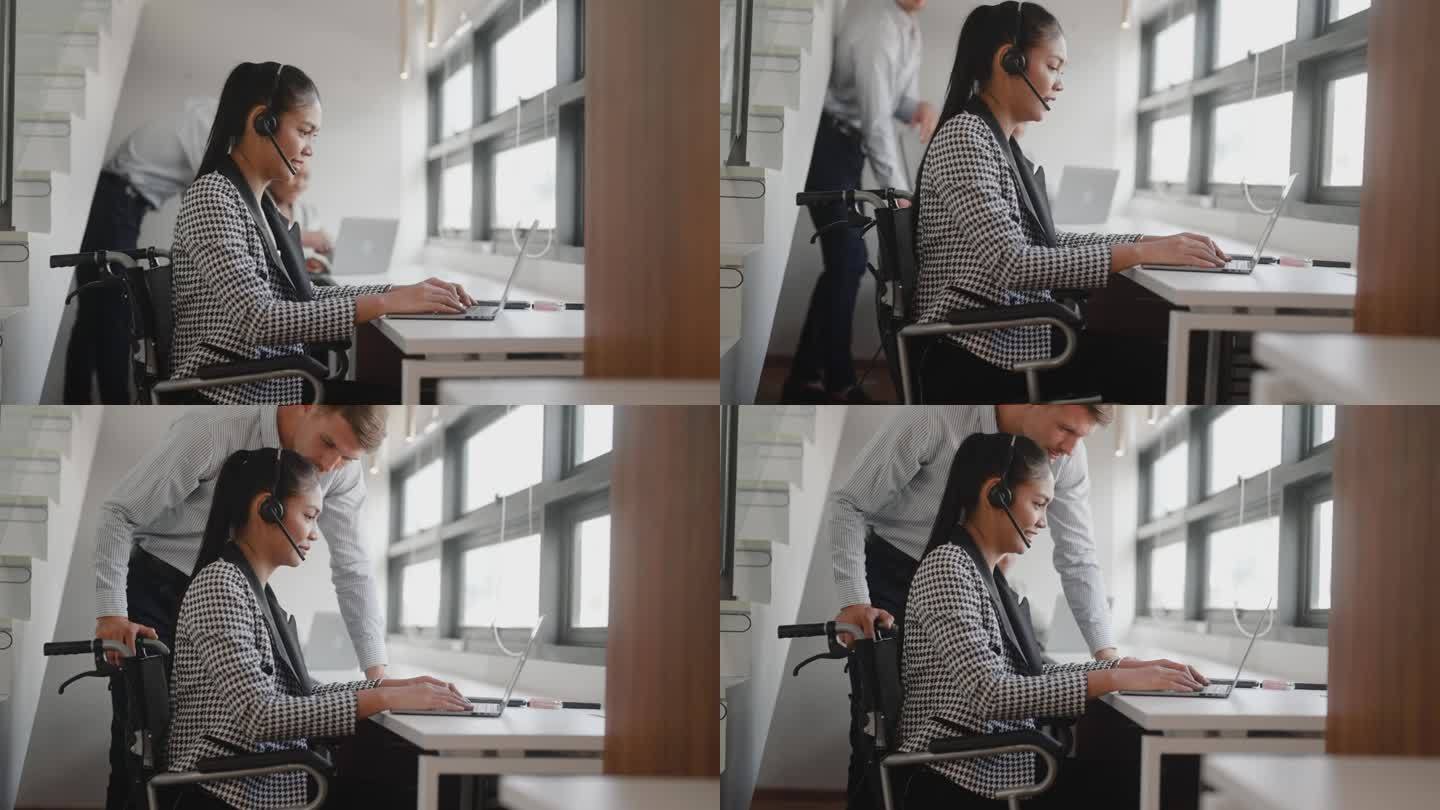 年轻女子坐在轮椅上，在办公室里使用笔记本电脑。