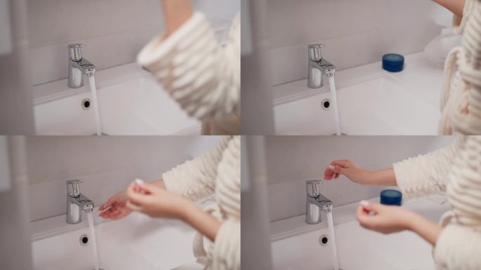 用浴室里光滑的水龙头流出的水清洗水槽