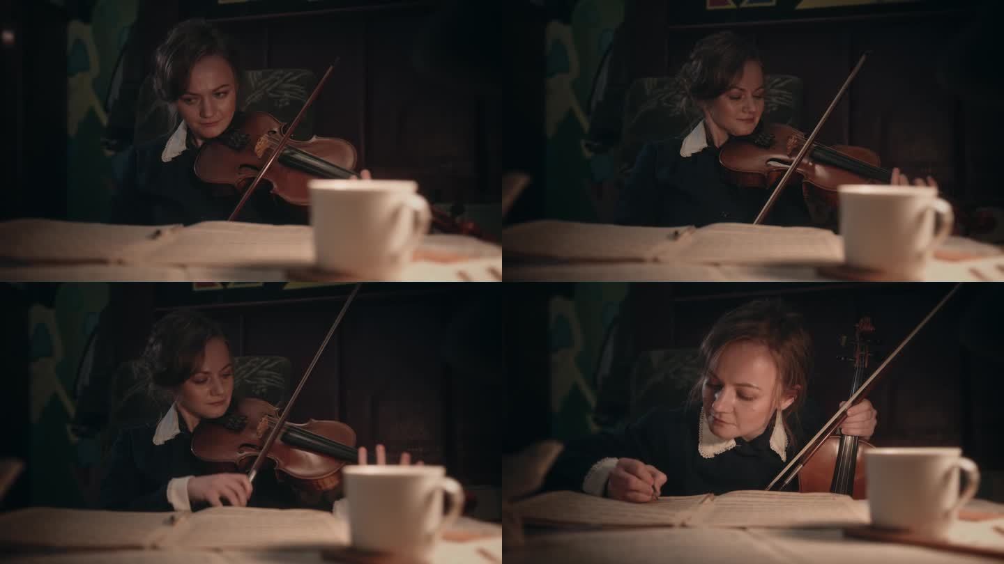 一个女人在昏暗的房间里拉小提琴
