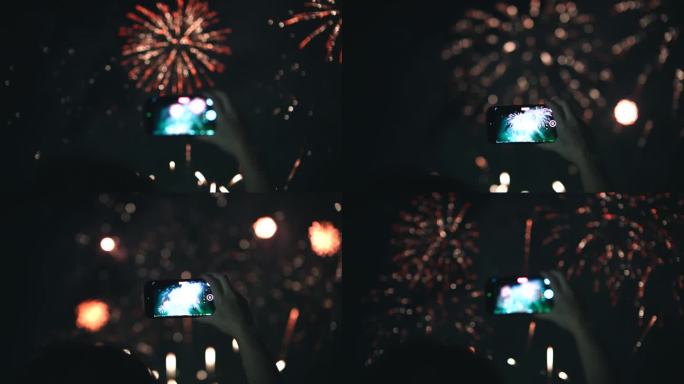 拍摄新年庆祝活动在晚上放烟花