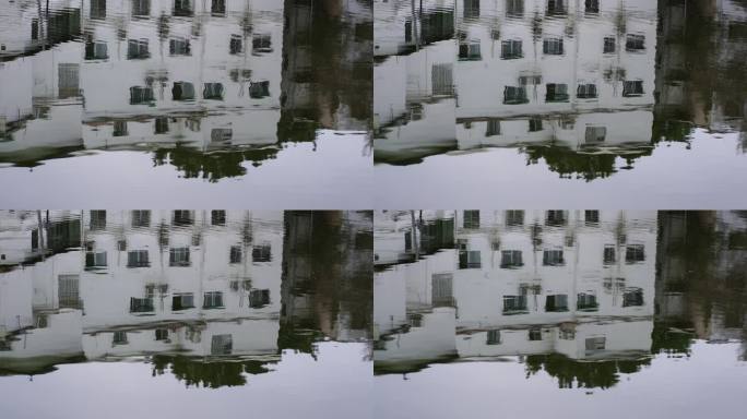 白色房子水中倒影