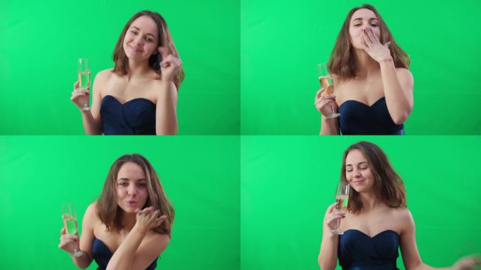 醉醺醺的年轻女子拿着香槟酒杯看着镜头跳舞，做着飞吻的手势。醉醺醺的白人女士在派对上的肖像，在绿幕背景