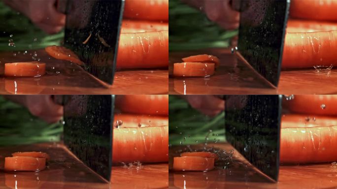 刀切胡萝卜溅出水花。用高速摄像机拍摄，每秒1000帧。