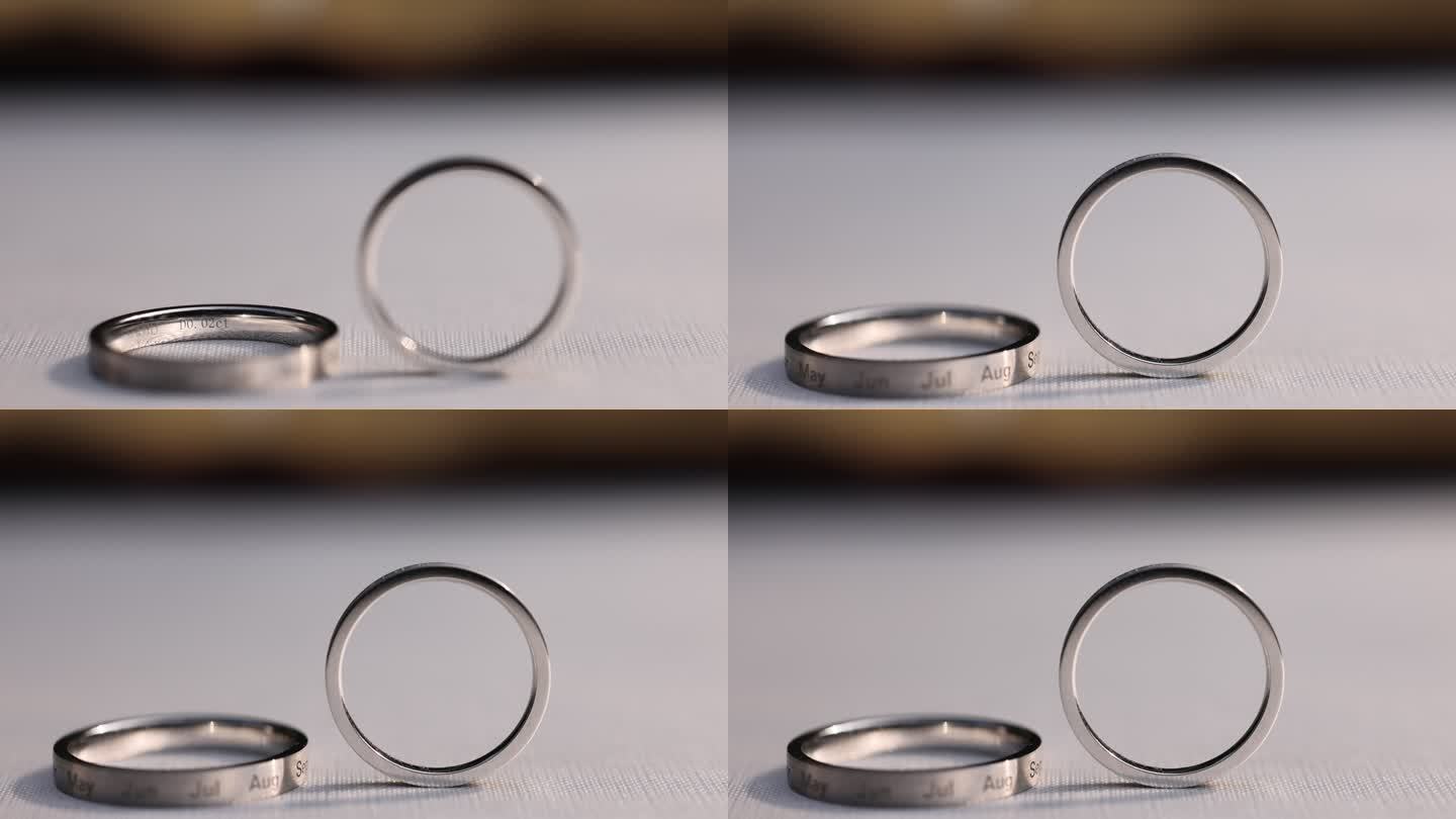 结婚婚礼戒指拍摄大小婚戒白色桌布光影倒立