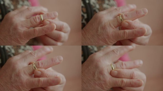 永恒的优雅:特写的老年妇女的手装饰一个金戒指