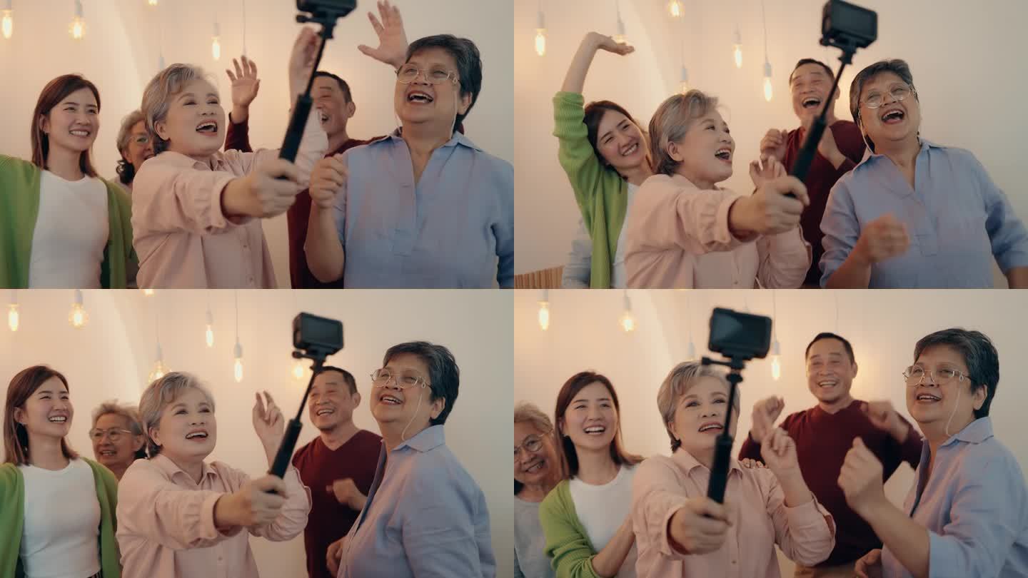 幸福的黄金岁月:亚洲老年朋友捕捉欢乐时刻在家里跳舞。