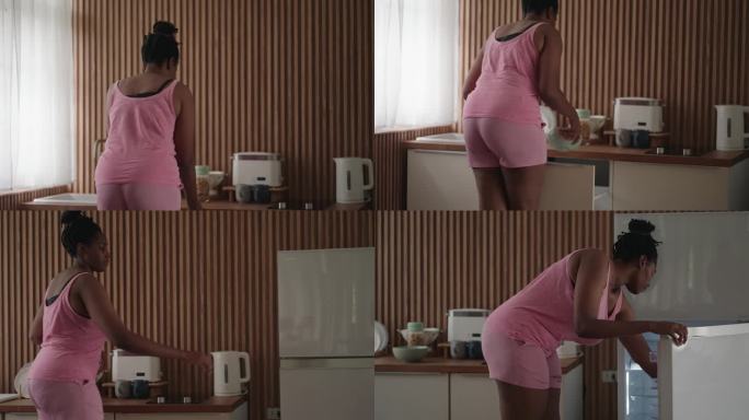 一位黑人妇女正在准备早餐