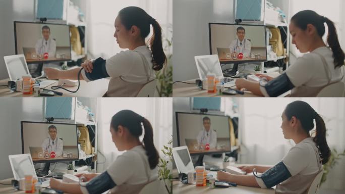 一名亚洲妇女在网上咨询医生时使用血压监测仪
