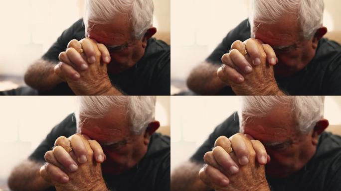 戏剧性的宗教老人致力于祈祷。一位年长的白人男性参与了希望与信仰