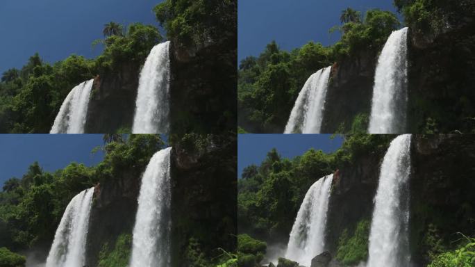 阿根廷的伊瓜苏瀑布，阳光明媚的南美天气条件，美丽的丛林瀑布，两个大的慢动作瀑布，伊瓜苏瀑布的全景