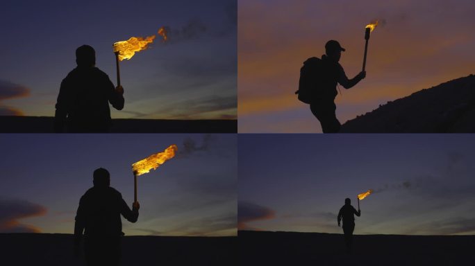 举着火把走路探险家黑夜里举着火把探索前行