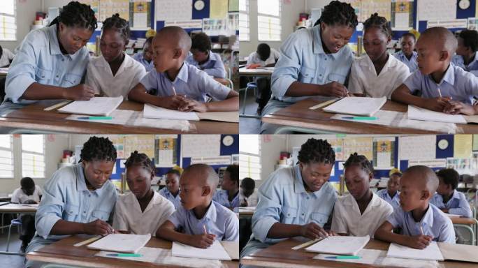 特写镜头。在非洲的一间教室里，一位非洲黑人女教师坐在桌前帮助非洲孩子画画